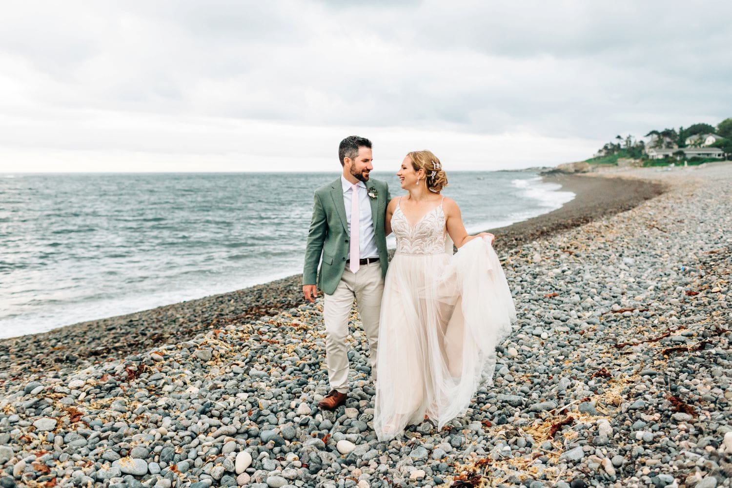 bride-and-groom-walking-on-beach